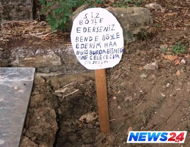Qəbiristanlıqda şok: Məzarı söküb üzərinə görün nə yazdılar