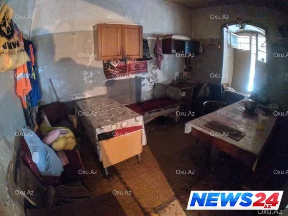 Qolu sarğılı süpürgəçi qadın kimdir? - FOTO