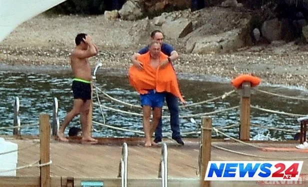 Qazaxıstan prezidenti çimməyə də mühafizəçiləriylə getdi