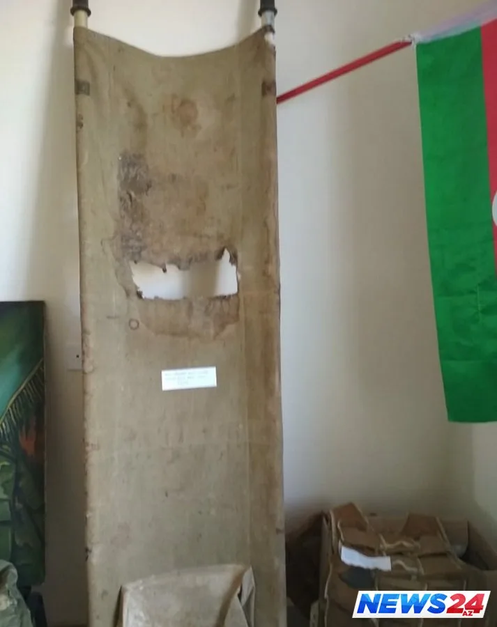 Şəhidlərimizin bədənindən çıxarılan qan ləkəli qəlpə və güllələr - VİDEOREPORTAJ