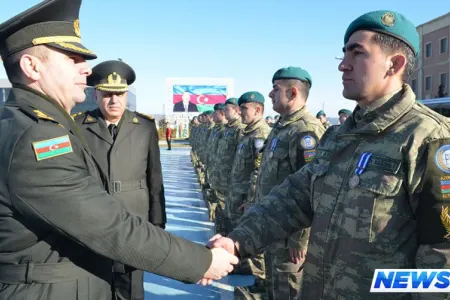 Əfqanıstandakı sülhməramlılarımızın bir qrupu Azərbaycana qayıdıb - FOTO