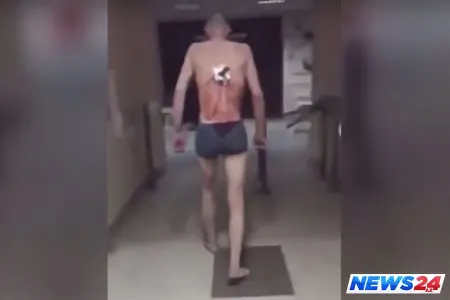 Belində bıçaq siqaret çəkməyə çıxdı - VİDEO