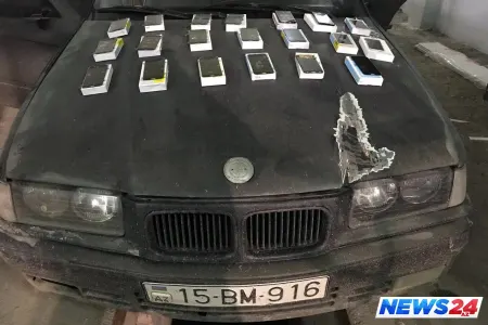 Gürcüstanda telefon ekranlarını gizli keçirmək istəyən şəxs sərhəddə saxlanıldı
