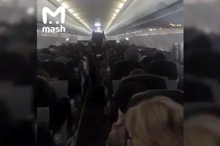 Çantadakı bombanı partlatmaqla hədələdi, təyyarə təcili eniş etdi - Video