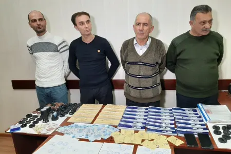 Saxta sənədlərlə əməliyyatlar aparan - DƏSTƏ TUTULDU - FOTO