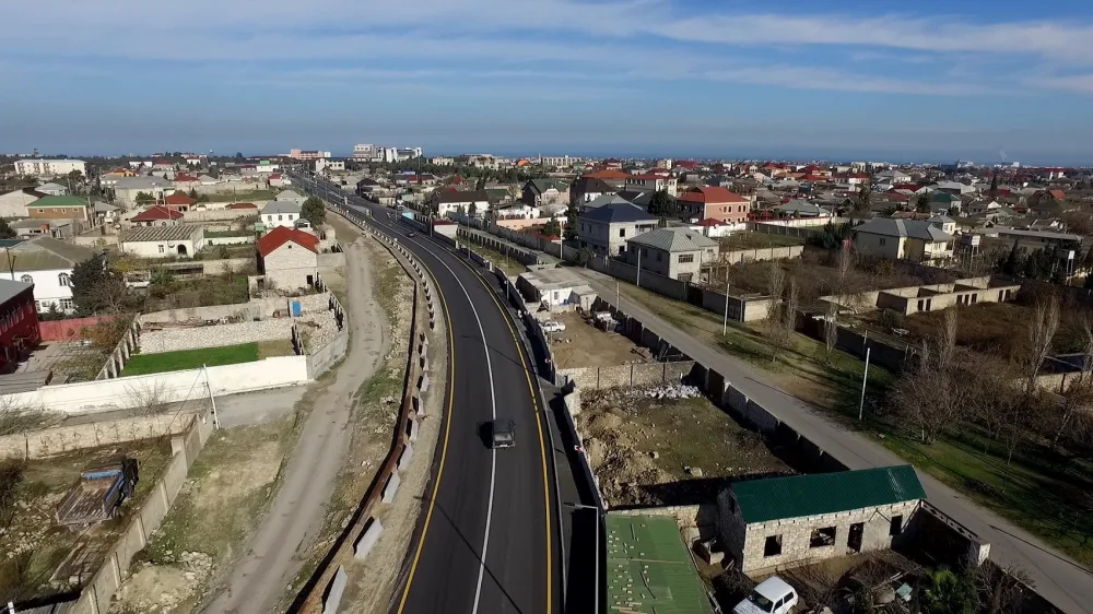 Xəzər rayonunda son üç ayda 18 kilometr yol - TƏMİR EDİLİB - FOTO