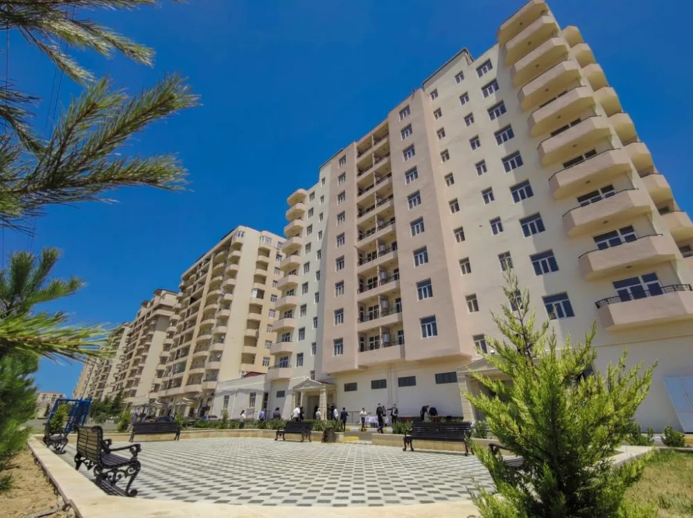 Şəhid ailələri və Qarabağ müharibəsi əlillərinə daha 100 mənzil verildi - FOTO