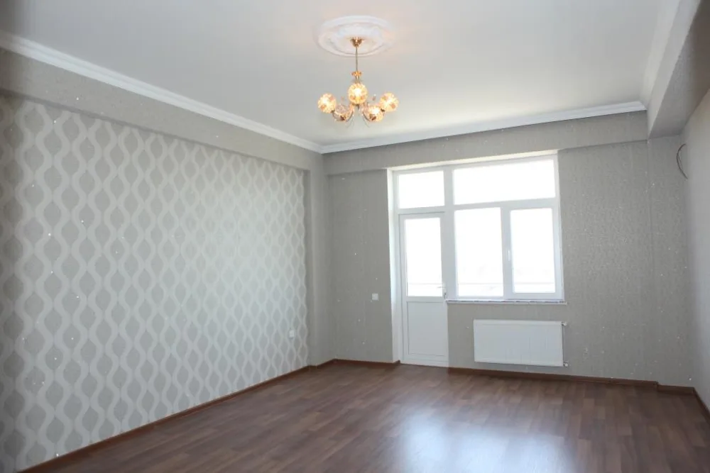 Şəhid ailələri və Qarabağ müharibəsi əlillərinə daha 100 mənzil verildi - FOTO