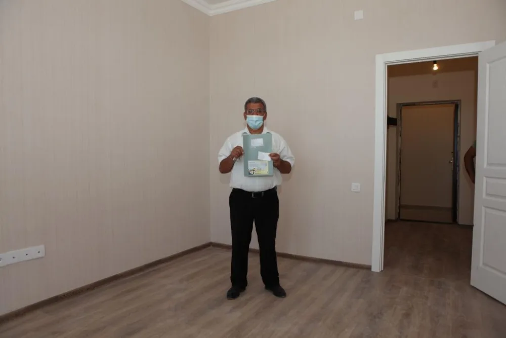 Şəhid ailələri və Qarabağ müharibəsi əlillərinə daha 100 mənzil verildi - FOTO