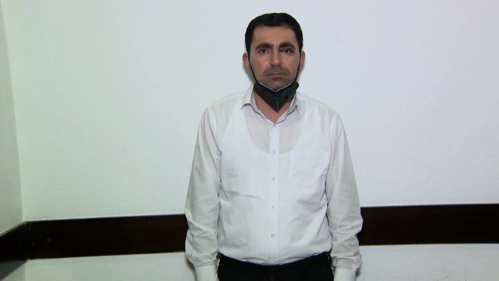 Hədə-qorxu ilə pul tələb edən "polis" tutuldu - VİDEO - Fotolar