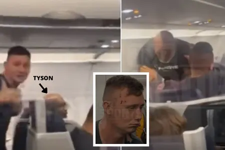 Tayson təyyarədə onu bezdirən fanatını döydü - VİDEO