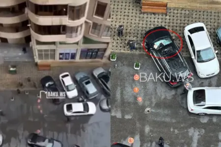 Bakıda gənc oğlan 15-ci mərtəbədən maşının üstünə düşdü - VİDEO