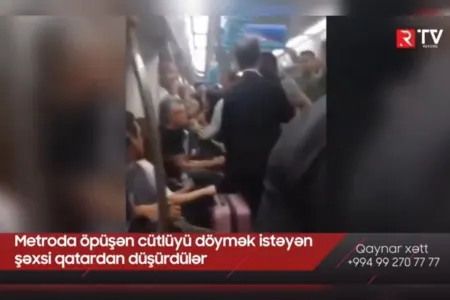Metroda öpüşən cütlüyü - DÖYMƏK İSTƏDİLƏR - VİDEO