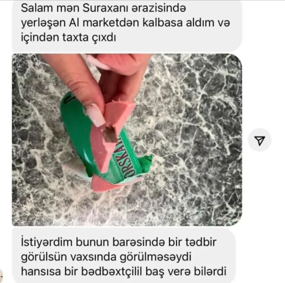 Bakıda kolbasadan taxta çıxdı - FOTO