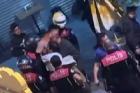 Davanı ayıran polis əməkdaşını vurdu