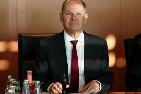 Şolts Bürgenştok konfransını tərk ETDİ
