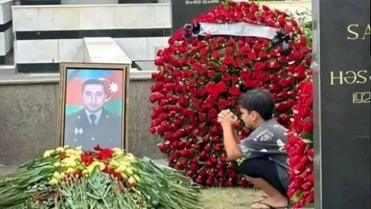 Bakıda öldürülən polisin məzarı - FOTO