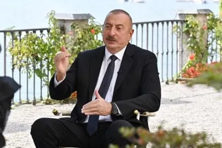 Putinə yuxarıya çıxan qayaları göstərdim... - Prezident