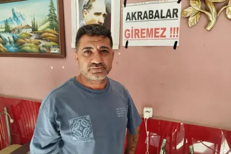 Dükanına “Qohumlar girə bilməz” yazılmış pankart asdı