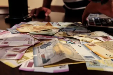 Zədələnmiş pul harada və necə dəyişdirilir?