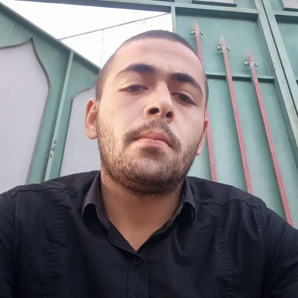 Üstündən maşın keçən gəncin - FOTOSU