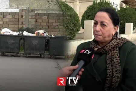 Yarımçıq şəhid abidəsi və zibil qabları - VİDEO