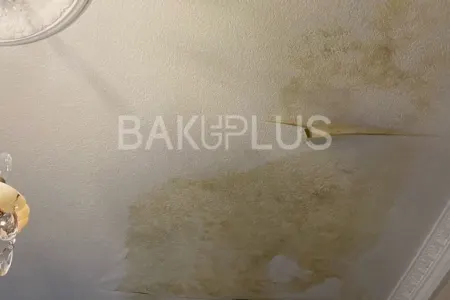 Bakıda bina sakinləri su sızmasından əziyyət çəkir