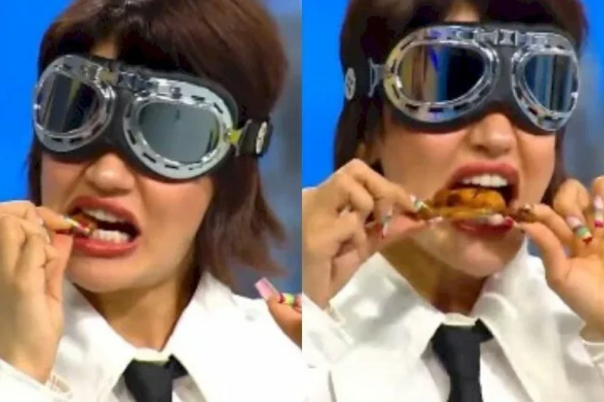 Hissə canlı yayımda qurbağa yedirtdilər - VİDEO