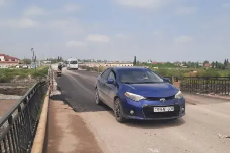 Qubada qəzalı vəziyyətə düşən körpü bərpa olundu