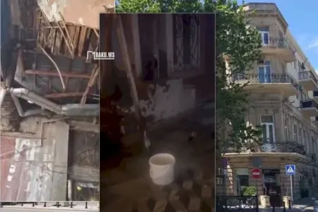 Bakının mərkəzində binanın tavanı çökdü - İçərini su basdı