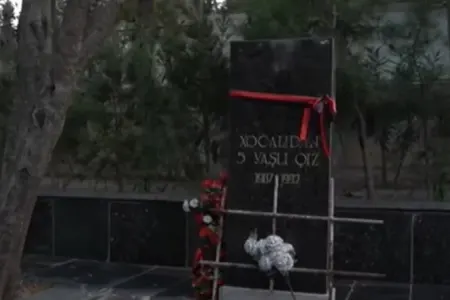 5 yaşlı Xocalı qurbanının məzarı açıldı - VİDEO