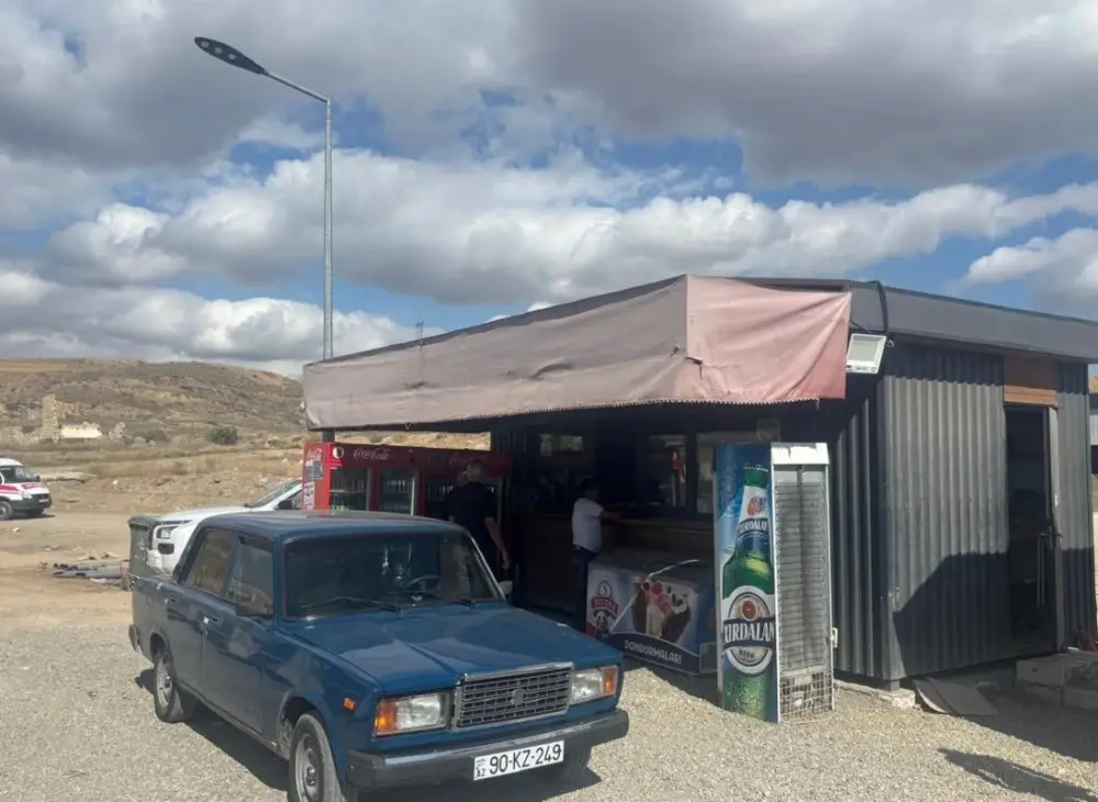 Cəbrayılda ərzaq mağazasında alkoqollu içkidən milçək çıxdı