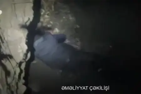 Körpüdən keçərkən çay dərəsinə yıxıldı - Video