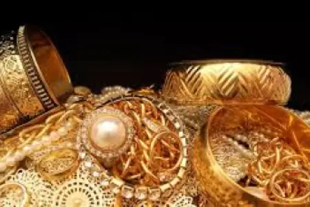 Bakıda evdən 8 min dollarlıq qızıl oğurlandı 