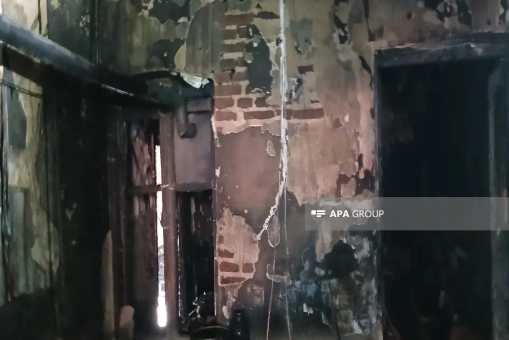 Gəncədə yaşayış binasında yanğın oldu, sakinlər təxliyə edildi - FOTO