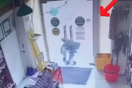Bakıda mağazanı talayan şəxs kameraya düşdü - Video