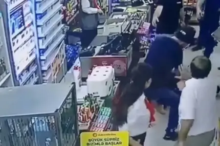 Bakıda kişi marketdə arvadını döydü – VİDEO