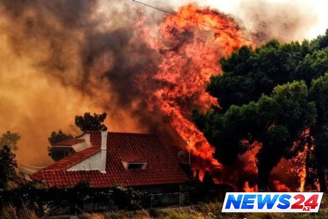 Yunanıstanda  25 nəfər bir-birini qucaqlayıb yandı - VİDEO 