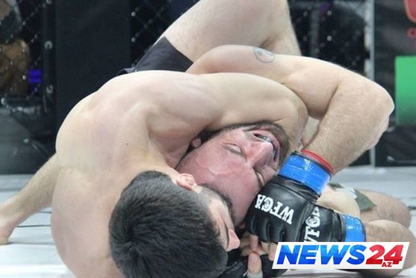 Hakim nokauta düşən MMA döyüşçüsünü “boğdu” - VİDEO 