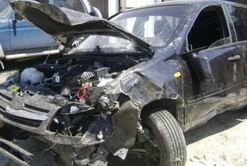 "Nissan" "Opel"lə toqquşdu, ata öldü, oğul yaralandı