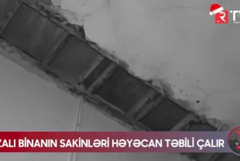 Qəzalı binanın sakinləri həyəcan təbili çalır - VİDEO